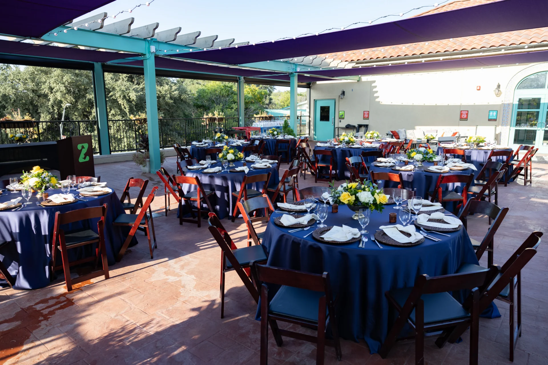 an event space with tables and chairs